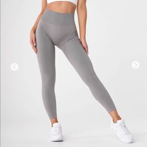 Brand new NEVER WORN NVGTN leggings, solid seamless in light gray